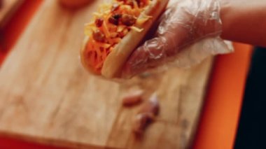 Process of preparing Irresistible chili cheese Hot Dogs. Taste USA cuisine.