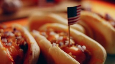 Process of preparing Irresistible chili cheese Hot Dogs. Taste USA cuisine.