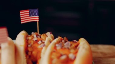 Process of preparing Irresistible chili cheese Hot Dogs. Taste USA cuisine.