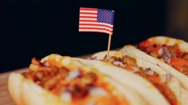 Process of preparing Irresistible chili cheese Hot Dogs. Taste USA cuisine.