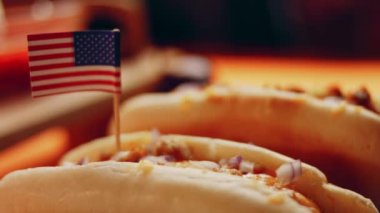 Process of preparing Irresistible chili cheese Hot Dogs. Taste USA cuisine.