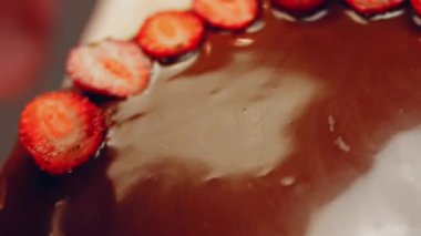 hallucination effect of Favorite chocolate Cake with Nutella Buttercream and Strawberries. Taste USA cuisine.