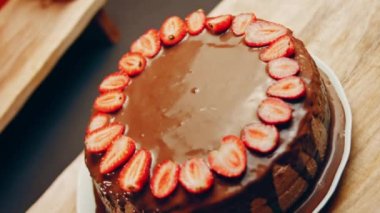 hallucination effect of Favorite chocolate Cake with Nutella Buttercream and Strawberries. Taste USA cuisine.