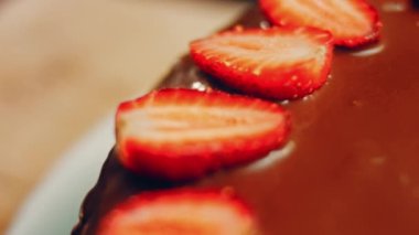 hallucination effect of Favorite chocolate Cake with Nutella Buttercream and Strawberries. Taste USA cuisine.