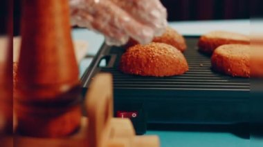 Preparing process of Cinematographic Smoked Salmon bagels. USA cusine.