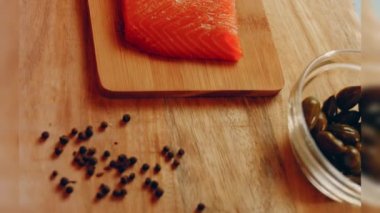 Preparing process of Cinematographic Smoked Salmon bagels. USA cusine.