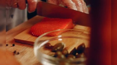 Preparing process of Cinematographic Smoked Salmon bagels. USA cusine.