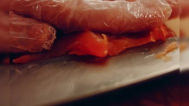 Preparing process of Cinematographic Smoked Salmon bagels. USA cusine.