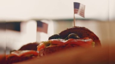 Preparing process of Cinematographic Smoked Salmon bagels. USA cusine.