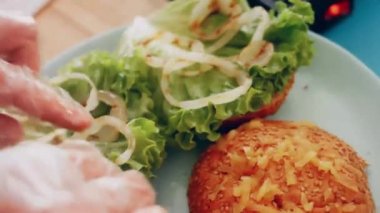 transition effect of green tomato blt burger, vegan burger.