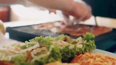 transition effect of green tomato blt burger, vegan burger.