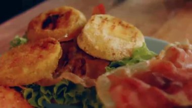 transition effect of green tomato blt burger, vegan burger.