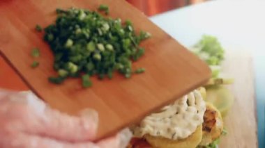 transition effect of green tomato blt burger, vegan burger.