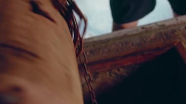 The man drinks water from the fountain. Balkan style fountain. Tourism.