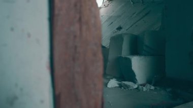 Destruction: ruin of abandoned and demolished building after a war, grenade explosion or cataclysm. Bare walls of derelict old house due to hurricane, earthquake or tsunami damage.