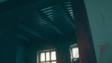 Destruction: ruin of abandoned and demolished building after a war, grenade explosion or cataclysm. Bare walls of derelict old house due to hurricane, earthquake or tsunami damage.