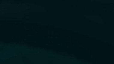 Silhouette of beautiful car on smoked dark background . Car lights on fog