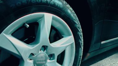 Close up of car headlights of a car. Car details presentation in slowmotion.