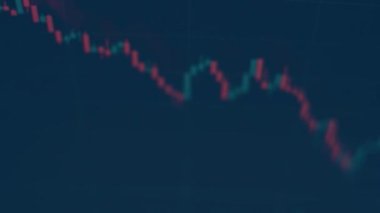 Screen with a stock market graphic. Cryptocurrency rate graphic showing data online. Japanese candlesticks and the volume of cryptocurrency turnover.