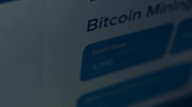 Cryptocurrency mining on a computer screen. The algorithm of the computer program on the monitor. Execution of the program code for the mining program. Pop-up lines of a computer program.