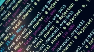 Cryptocurrency mining on a computer screen. The algorithm of the computer program on the monitor. Execution of the program code for the mining program. Pop-up lines of a computer program.