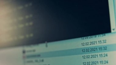 Cryptocurrency mining on a computer screen. The algorithm of the computer program on the monitor. Execution of the program code for the mining program. Pop-up lines of a computer program.