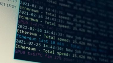 Cryptocurrency mining on a computer screen. The algorithm of the computer program on the monitor. Execution of the program code for the mining program. Pop-up lines of a computer program.