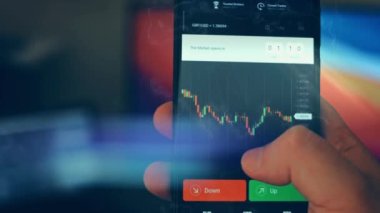 Caucasian male making a payment with bitcoins cryptocurrency using his smartphone. Custom application interface design. 4K UHD RAW edited footage