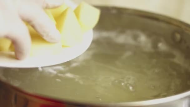Close View Boiling Water Yellow Raw Potatoes Saucepan Young Potato — Stock Video
