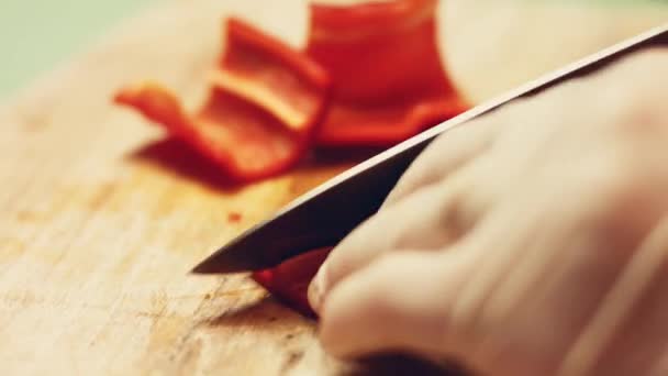 Male Hand Chop Red Sweet Pepper Half Sharp Knife Wet — Stock Video