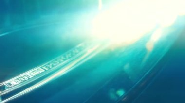 Silhouette of beautiful car on smoked dark background . Car lights on fog