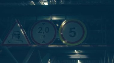 Car auto parking at the airport terminal security system boom barrier gate at night