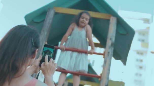 Happy Smiling Preschool Girl Small House Playground Mother Taking Photo — Stock Video