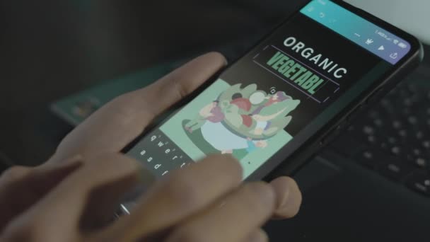 Organic Vegetables Inscription Smartphone Designer Making Advertisement Design Mobile App — Stock Video