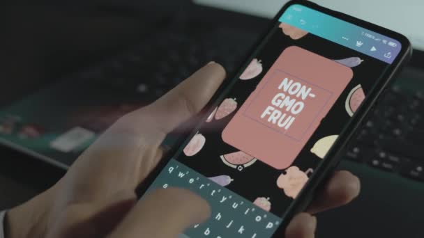 Non Gmo Fruits Inscription Smartphone Designer Making Advertisement Design Mobile — Stock Video