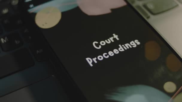 Court Proceedings Inscription Smartphone Screen Graphic Presentation Black Background Bokeh — Stock Video