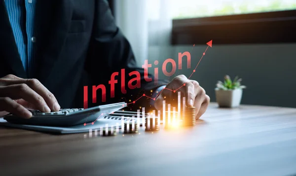 stock image Businessman analyzes inflation for business planning in an inflationary economy, and inflation control, US dollar inflation, causes, effects, and management strategies for a stable economy