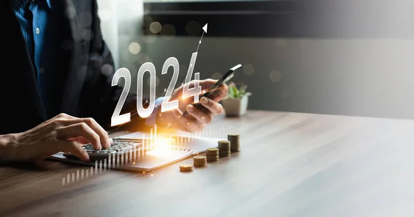 sustainable business growth in 2024, Businessman analysis profitability of working companies with digital augmented reality graphics, Businessman calculating financial data for long-term investments