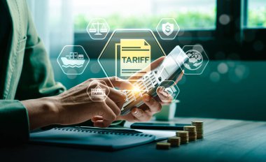 Digital Tariff Management and International Trade Calculation Concept with Businessman Using Calculator for Global Import Export Cost Analysis and Economic Strategy Planning