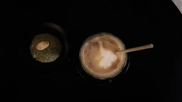 coffee latte on black background Paris, France