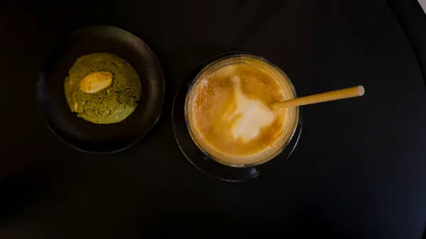 latte coffee with matcha powder and coffee Paris, France