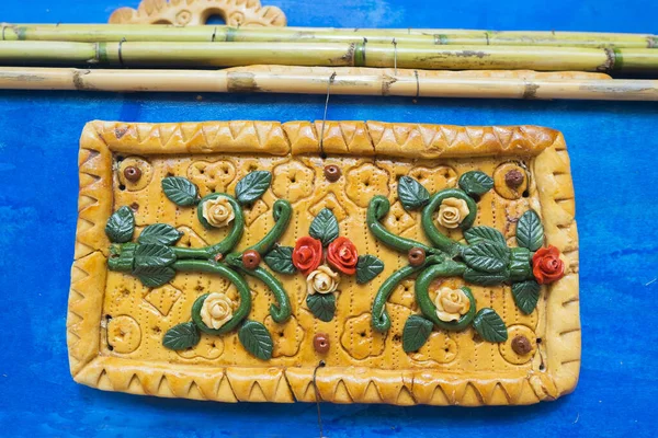 Traditional Easter decoration from reed and bread dough is installed on city streets each year in San Biagio Platani, Italy