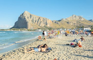San Vito Lo Capo Sicilia,lover couple men and woman on the beach of San Vito Lo Capo Sicily Italy