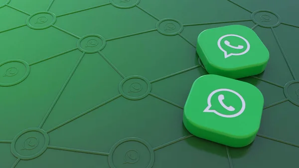 Yeşil arka planda iki Whatsapp rozeti sosyal ağlar aracılığıyla bağlantı kavramını temsil ediyor.