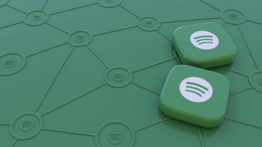 Yeşil arkaplandaki iki Spotify rozeti, yayın ağları aracılığıyla bağlantı kavramını temsil ediyor.