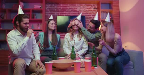 Young People Gathered Home Wearing Party Hats Eating Snacks Drinking — Stock Video