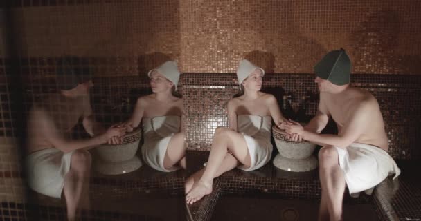 Young Couple Relaxing Spa Sauna Room Romantic Lovers Enjoying Vacation — Vídeos de Stock