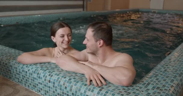 Young Couple Bathing Together Loving Couple Flirting Pool Spa — Stockvideo