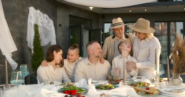 Cheerful Extended Family Communicating While Gathering Dining Table Outdoors Anniversary — Video