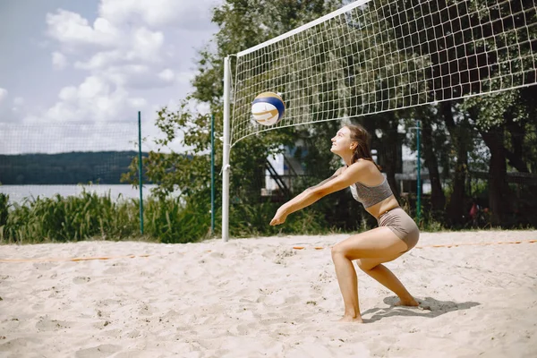 stock image Beach volleyball woman playing game. Healthy active lifestyle